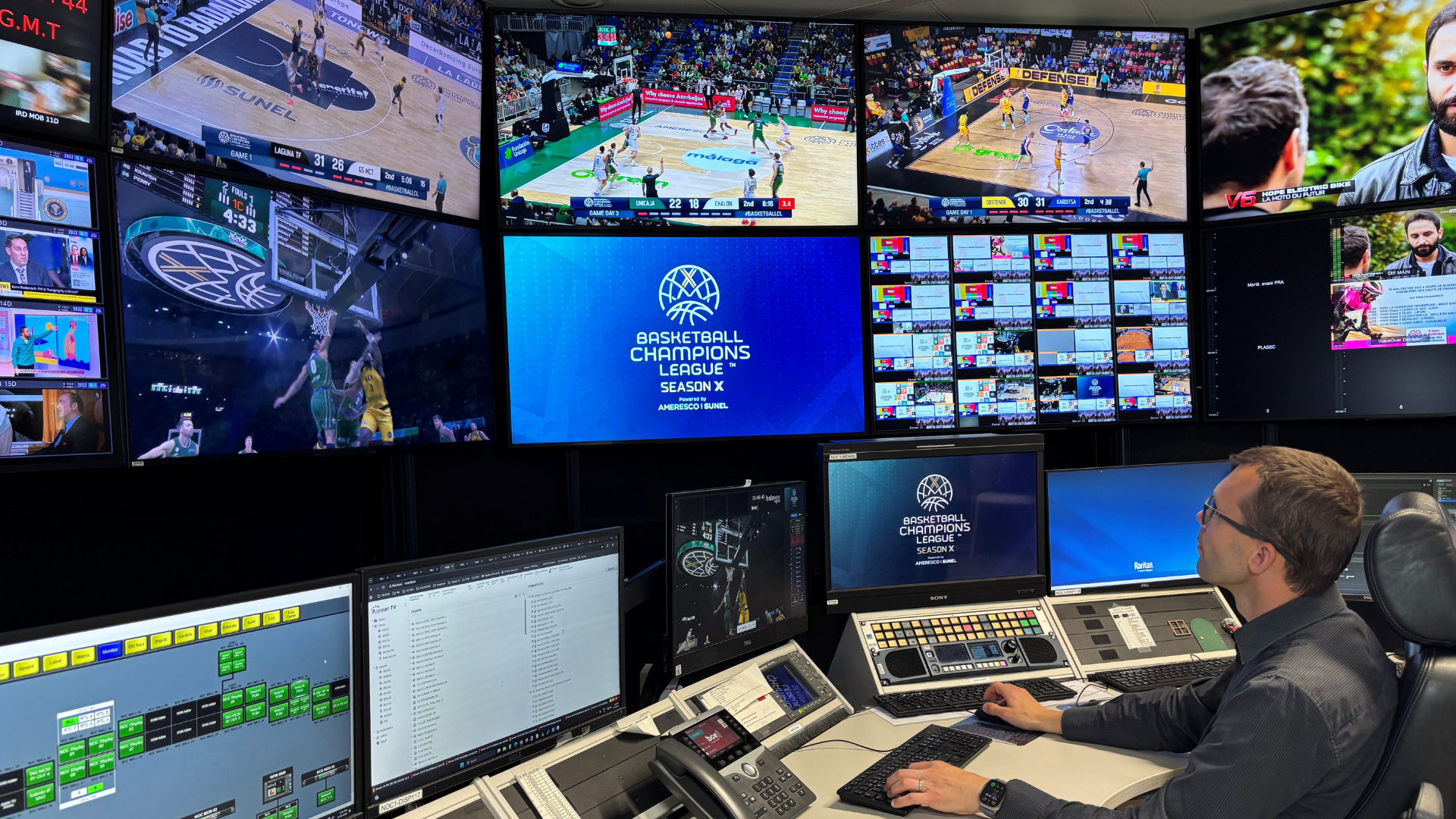 BCE operator monitoring live Basketball Champions League feeds and broadcast signals from the Network Operations Center (NOC).